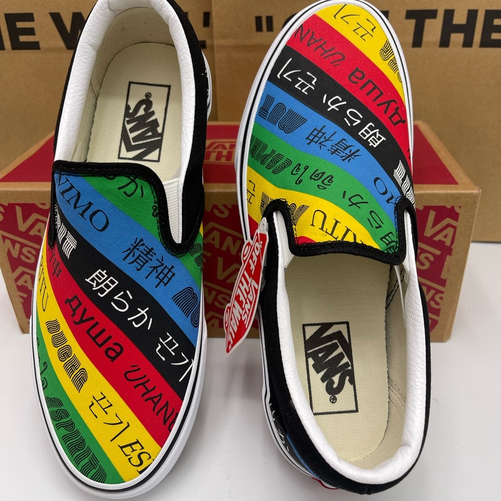 Vans Men’s Classic Slip-On (Vans
Spirit)Multi/True White Sneakers
VN0A4U38WK2